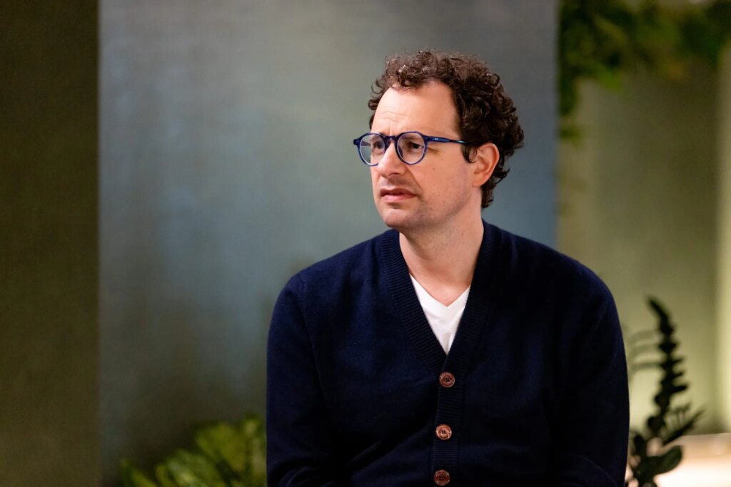 Anthropic's head of economics just explained why we haven't seen a white-collar bloodbath — yet