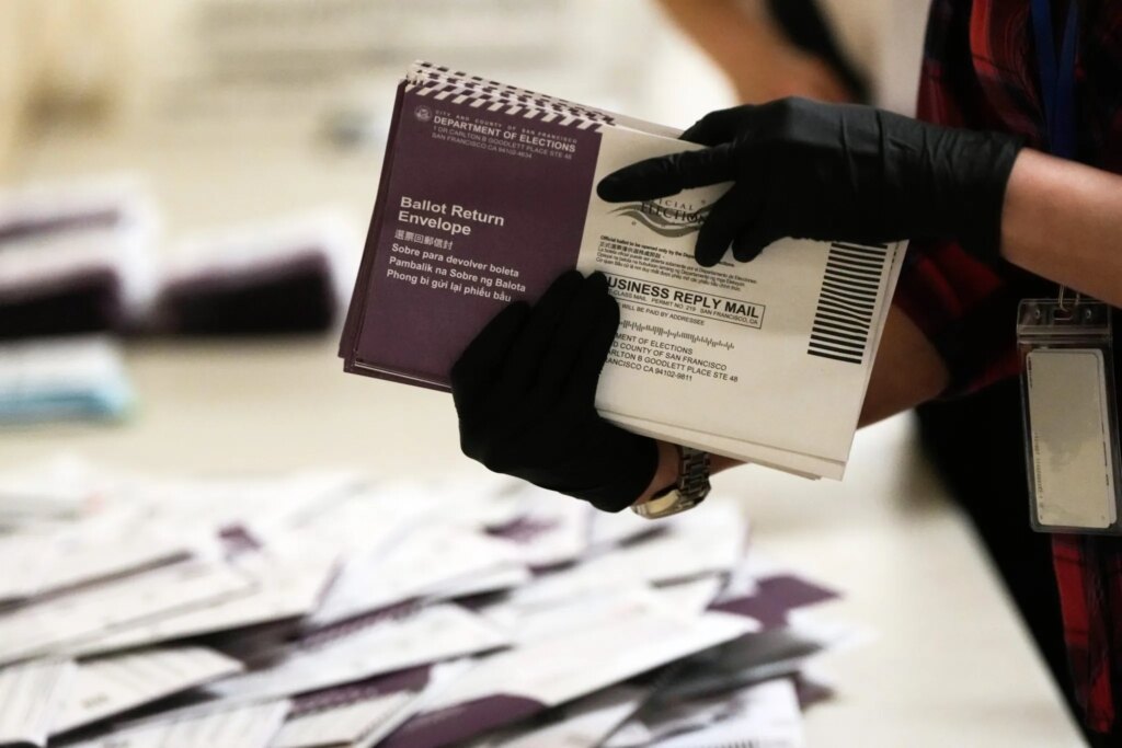 Appeals court upholds block on Trump order to create a federal list of voters and limit mail ballots