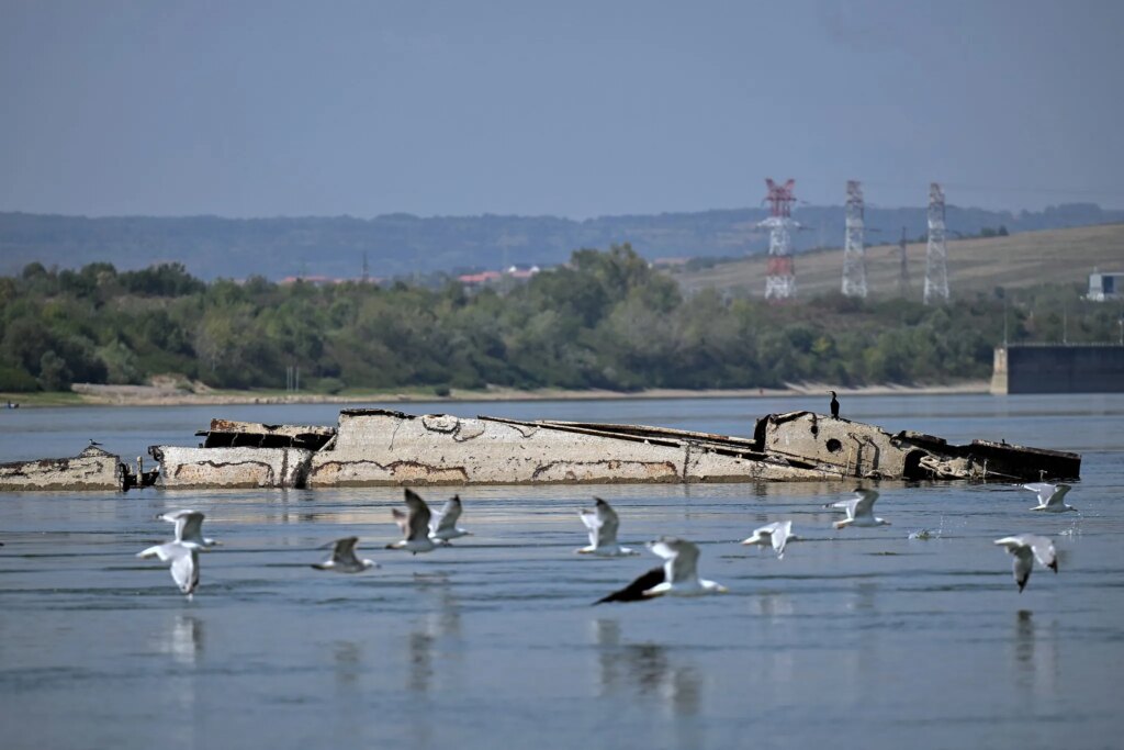 Danube River's shrinking water levels expose dozens of World War II ships